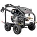 A black Simpson pressure washer with a hose and wheels.