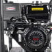 A close up of a black Honda gasoline engine.