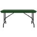 A green rectangular Correll folding table with black pedestal legs.