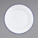 a white plate with a black handle