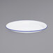 A white Crow Canyon Home enamelware platter with a blue rim.