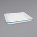 a white and blue rectangular baking dish