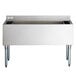 A stainless steel Regency underbar ice bin with bottle holders.