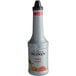 A Monin bottle of guava fruit puree.