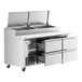 An Avantco stainless steel refrigerated pizza prep table with four drawers.