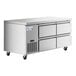 An Avantco stainless steel undercounter refrigerator with four drawers on wheels.