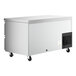 An Avantco stainless steel undercounter refrigerator with four drawers on wheels.