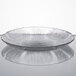 a clear glass bowl with ripples