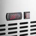 An Avantco stainless steel refrigerated pizza prep table with a digital temperature display.