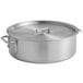 An 18 quart aluminum brazier with a lid.