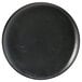 A black Front of the House round porcelain plate with spiral lines.