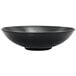 A close up of a Front of the House Spiral Ink semi-matte black wide bowl.