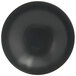 A black porcelain bowl with a spiral pattern of white lines.