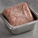 A square pan filled with Beyond Meat plant-based ground beef on a table.