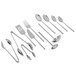 A Carlisle Terra stainless steel solid serving spoon with a hammered design.