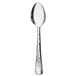 A Libbey stainless steel teaspoon with a silver handle.