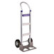 a silver and black hand truck