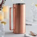 a close-up of a copper cylinder