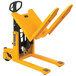 A yellow Wesco pallet truck with black handle.