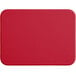 A red rectangular Tomlinson Chef's Edge cutting board with a white circle in the corner.