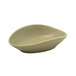 A Front of the House Tides sea grass oval ramekin with a curved edge.