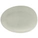 A white Front of the House Tides oval porcelain plate.