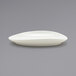 A close up of a white Front of the House Tides scallop oval porcelain plate.