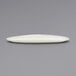 A white Front of the House Tides scallop oval porcelain plate.