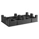 A black plastic Regency dunnage rack with a slotted top.