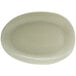 A white oval Front of the House Tides porcelain plate.