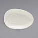 A white oval plate with a circle in it.