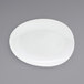 A white Front of the House Tides oval porcelain plate.