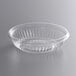 a clear plastic bowl with a curved edge