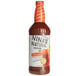 A bottle of Nina's Natural Michelada Mix with a label.