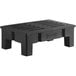 A black plastic dunnage rack with a slotted top.