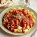 A plate of pasta with Bella Vista Low Sodium Tomato Sauce and cheese on it.