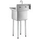 a stainless steel sink with legs