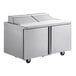 A Delfield stainless steel sandwich prep table with two doors.