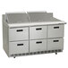 A Delfield stainless steel sandwich prep table with drawers.