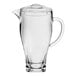 An Arcoroc clear plastic pitcher with a handle and lid.