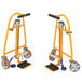 a pair of yellow hand truck