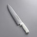 A Dexter-Russell chef knife with a white handle.