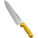 A yellow knife with a black handle.