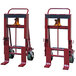 Two red Wesco Industrial Products machinery movers with black wheels.