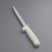 A Dexter-Russell Sani-Safe boning knife with a white handle.