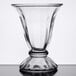 A clear Libbey tulip sundae glass with a foot.