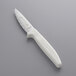 a white knife with a white handle
