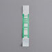 A white and green strip of paper with green text that says "Green Self-Adhesive Currency Strap $200"