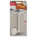 A Taylor meat thermometer with a metal probe and a red and white temperature gauge.