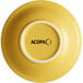 A yellow stoneware bowl with the word "Acopa" in black text.